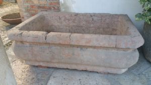 Shaped fountain in red marble